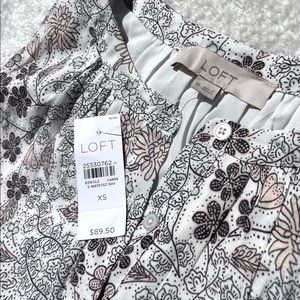 LOFT spring time dress. Size xs partial button down on the top.